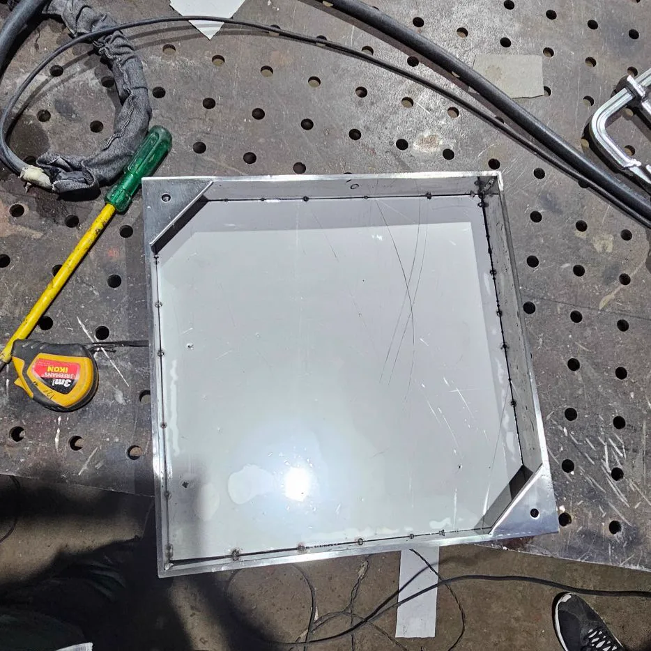 SS chamber cover tray and outer frame checked with a measuring tape